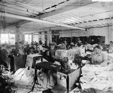 Maple and Co’s works. In Victorian and Edwardian Britain Maple and Co were amongst the most prestigious cabinet-makers and furniture retailers, with large premises on Tottenham Court Road. In this unidentified factory, workers are shown making tents.