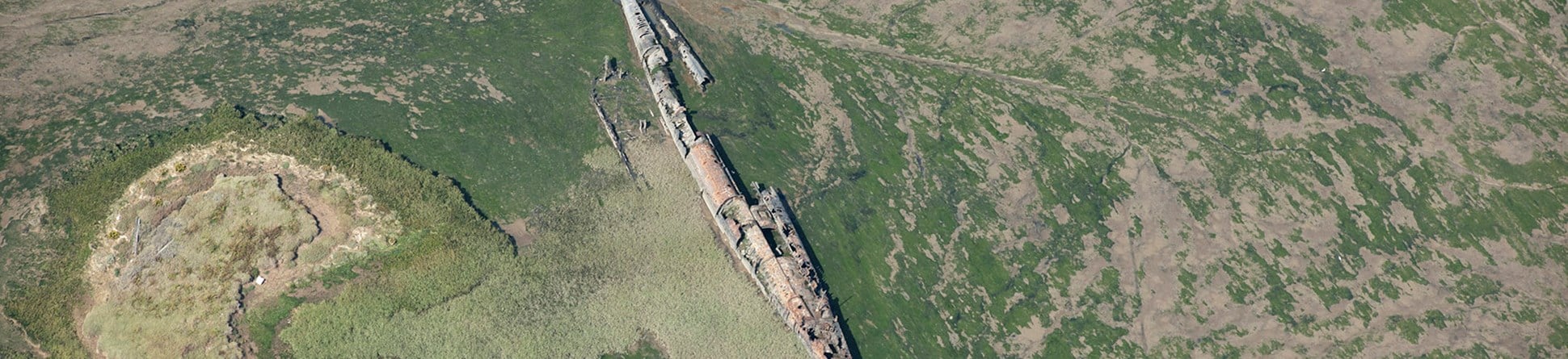 The River Medway, the rusting, skeletal remains of a German U-boat, believed to be UB122, which broke its tow while on its way to a scrapyard, lie preserved in tidal mudflats