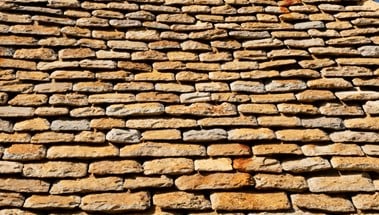 Stone roof tiles.