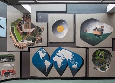 A mural depicting the world, forms of transport, and nature.