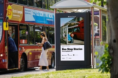 A bus pulled into a bus stop, public board the bus. A clear channel digital screen at the front of the bus stop shows a picture of a woman holding a balloon waiting for the bus. The title and subtitle read 'Bus Stop Stories #PicturingHighStreets'.