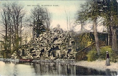 Old postcard showing a grotto next to a lake