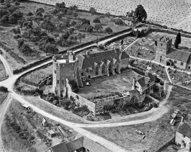 Aerial view of a fortified manor house.