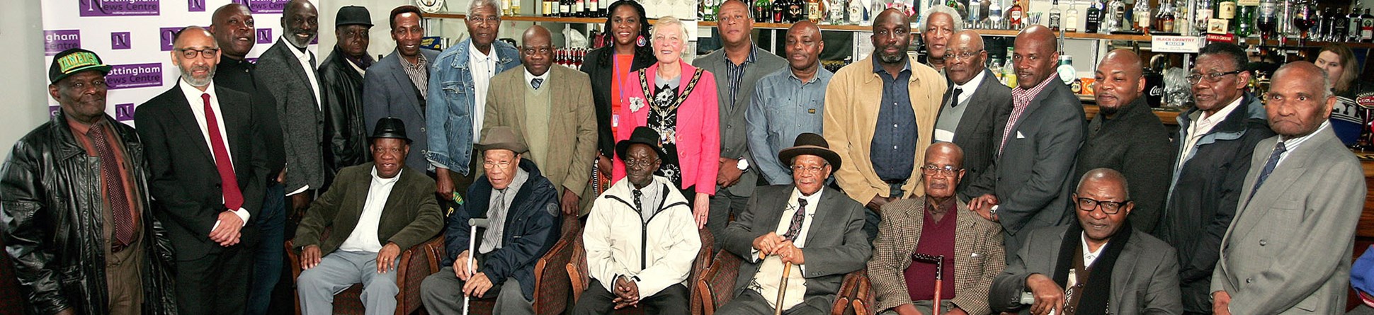 Former miners pose for a group photo at a reunion organised by the Black Miners Museum.