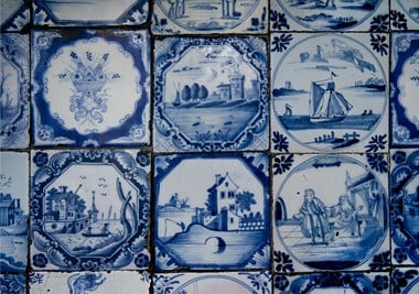 Square blue tiles, each showing a different scene.